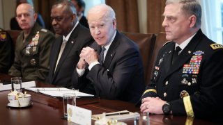 WASHINGTON, DC – APRIL 20: U.S. President Joe Biden meets with Secretary of Defense Lloyd Austin (2nd L), Commandant of the Marine Corps Gen. David Berger (L), Chairman of the Joint Chiefs of Staff Gen. Mark Milley (R), members of the Joint Chiefs of Staff, and combatant commanders in the Cabinet Room of the White House April 20, 2022 in Washington, DC.