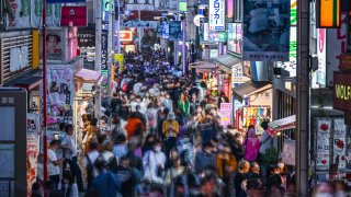 TOPSHOT – This photo taken on October 10, 2022 shows people walking down Takeshita Street in the Harajuku area of Tokyo.
