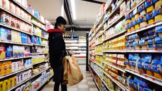 People shop at the Pioneer Supermarkets on January 12, 2023 in the Flatbush neighborhood of Brooklyn borough in New York City.