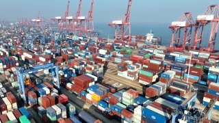 Cargo ships dock at the container terminal in Lianyungang Port, East China’s Jiangsu province, Dec 7, 2022.