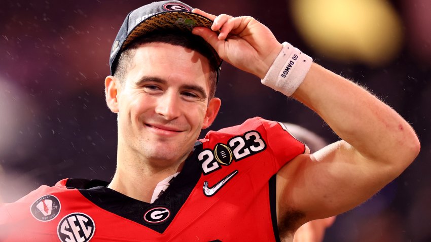 INGLEWOOD, CA – JANUARY 09: Stetson Bennett #13 of the Georgia Bulldogs celebrates the Bulldogs victory over the TCU Horned Frogs during the College Football Playoff National Championship held at SoFi Stadium on January 9, 2023 in Inglewood, California.