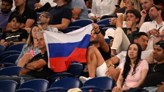 Flags from Russia and Belarus have been banned from the site of the Australian Open after more than one was brought into the stands by spectators at the year’s first Grand Slam tournament.