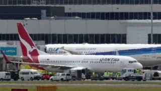 A Qantas Boeing 737-800 aircraft operating as flight QF144