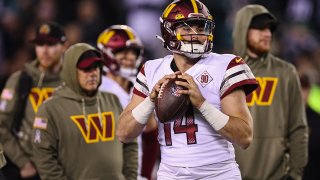 Sam Howell warms up before the game against the Philadelphia Eagles Nov. 14.