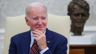 President Joe Biden listens to members of the press shout questions as he meets with Prime Minister Mark Rutte of the Netherlands in the Oval Office of the White House, Jan. 17, 2023.