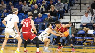 Police say University of Denver basketball player Coban Porter smelled of alcohol and was slurring his speech when he was arrested following a fatal crash in Denver on Sunday.