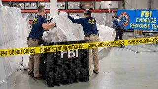 FBI Special Agents assigned to the Evidence Response Team process material recovered from the High Altitude Balloon recovered off the coast of South Carolina. The material was processed and transported to the FBI Laboratory in Quantico, VA.