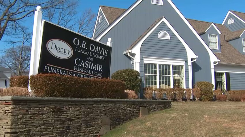 woman breathes funeral home li