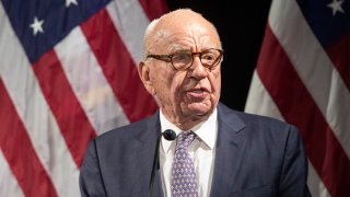 FILE – Rupert Murdoch introduces Secretary of State Mike Pompeo during the Herman Kahn Award Gala, in New York, Oct. 30, 2018., March 6, 2023.