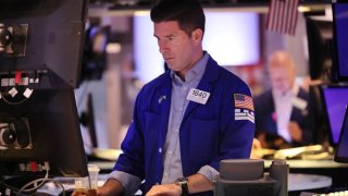 Traders work on the floor of the New York Stock Exchange during morning trading on April 10, 2023 in New York City.