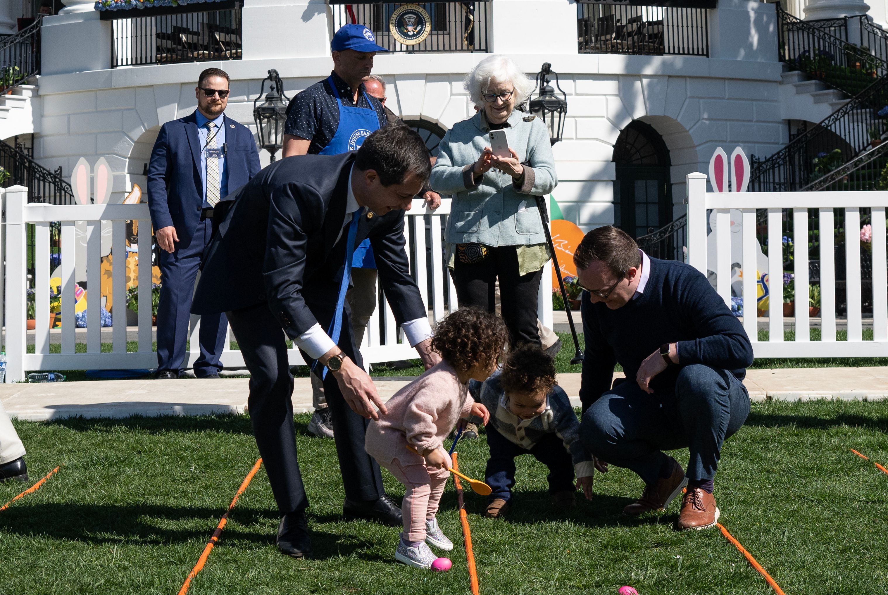 Transportation Secretary Pete Buttigieg, left, his husband Chasten Buttigieg and their children Penelope Rose and Joseph August participates in the annual Easter Egg Roll on the South Lawn of the White House in Washington, D.C, on April 10, 2023.