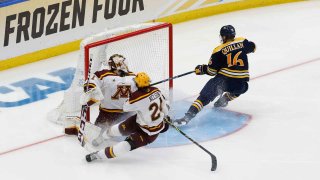 Jacob Quillan scores the game winning goal for Quinnipiac against Minnesota in overtime.