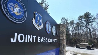 A military vehicle heads onto Joint Base Cape Cod on April 13, 2023, where Massachusetts Air National Guardsman Jack Teixeira worked with the 102nd Intelligence Wing on the base. Joint Base Cape Cod.