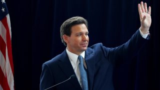 FILE - Florida Gov. Ron DeSantis waves to the crowd in the Air Force One Pavilion at the Ronald Reagan Presidential Library on March 5, 2023, in Simi Valley, California.