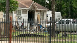 Exterior of a crime scene where five people, including an 8-year-old child, were killed after a shooting inside a home on April 29, 2023 in Cleveland, Texas.