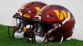 May 6, 2022; Ashburn, Virginia, USA; A view of Washington Commanders players’ helmets rest on the field during Commanders rookie minicamp at Inova Performance Center In Ashburn, VA. Mandatory Credit: Geoff Burke-USA TODAY Sports