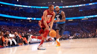 Kevin Durant dribbles past LeBron James during the 2012 NBA All-Star Game.