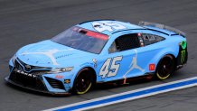 Tyler Reddick (No. 45, 23XI Racing, Jordan Brand Toyota) races in turn 3 during the running of the 64th annual NASCAR Cup Series Coca-Cola 600 on May 29, 2023 at Charlotte Motor Speedway in Charlotte, N.C.