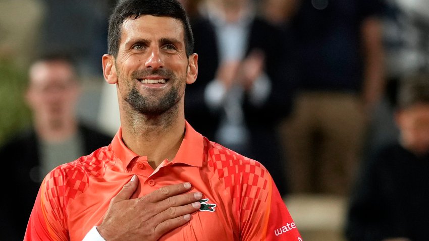 Serbia’s Novak Djokovic celebrates after beating Hungary’s Marton Fucsovics during their second round match of the French Open tennis tournament at the Roland Garros stadium in Paris, Wednesday, May 31, 2023.
