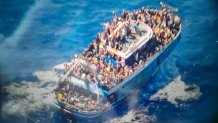 This undated handout image provided by Greece's coast guard on Wednesday, June14, 2023, shows scores of people covering practically every free stretch of deck on a battered fishing boat that later capsized and sank off southern Greece. A fishing boat carrying migrants trying to reach Europe capsized and sank off Greece on Wednesday, authorities said, leaving at least 79 dead and many more missing in one of the worst disasters of its kind this year.(Hellenic Coast Guard via AP)