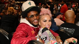 FILE - DC Young Fly and Jacky Oh attend the game between the Denver Nuggets and the Atlanta Hawks at State Farm Arena on Dec. 17, 2021, in Atlanta, Georgia.