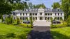 Tour ‘Chateau du Soleil', a $25M, 10-bedroom McLean mansion with a 200-inch TV