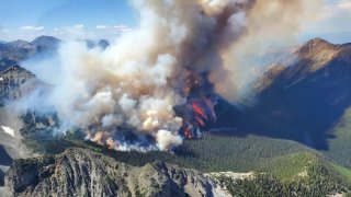 An aerial view of wildfire of Tatkin Lake in British Columbia, Canada on July 10, 2023.