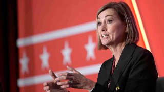 FILE - Iowa Gov. Kim Reynolds takes part in a panel discussion during a Republican Governors Association conference on Nov. 15, 2022, in Orlando, Fla.