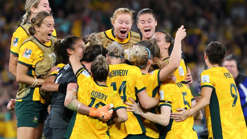 Australia players celebrate after winning the Women’s World Cup quarterfinal soccer match between Australia and France in Brisbane, Australia, Saturday, Aug. 12, 2023.