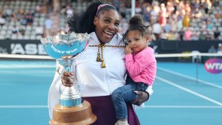 Serena Williams of the US with her daughter Alexis Olympia after her win against Jessica Pegula of the US during their women’s singles final match during the Auckland Classic tennis tournament in Auckland on January 12, 2020.