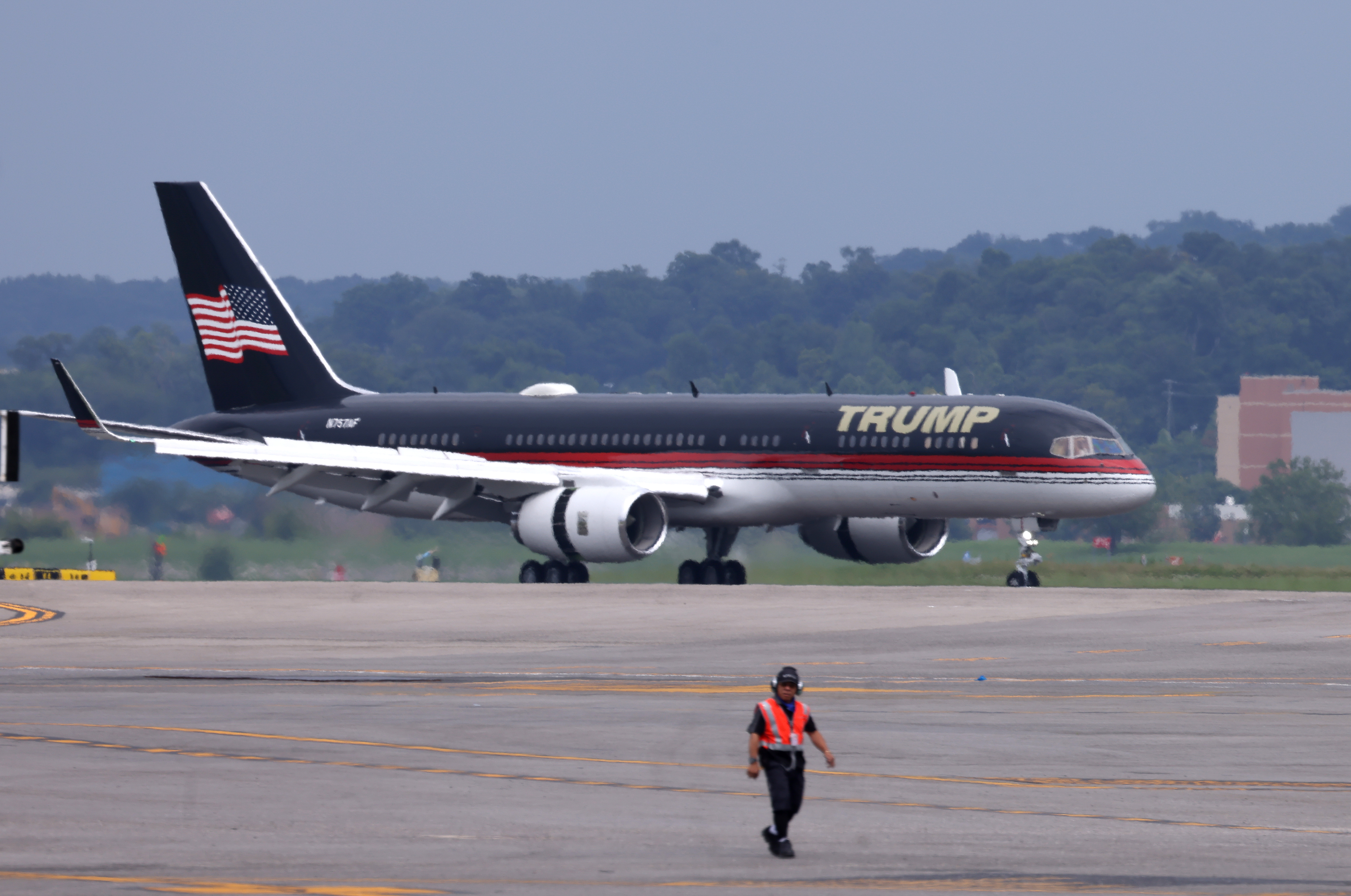 ARLINGTON, VIRGINIA – AUGUST 3:  A plane carrying former U.S. President Donald Trump taxis at Ronald Reagan Washington National Airport on August 3, 2023 in Arlington, Virginia. Trump is scheduled to be arraigned on four felony counts in federal court today for his alleged efforts to overturn the results of the 2020 presidential election. (Photo by Tasos Katopodis/Getty Images)