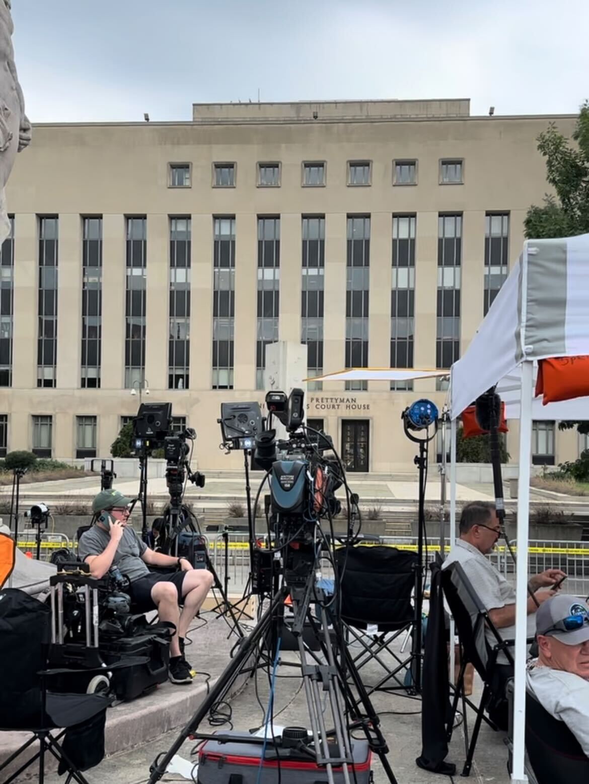 A sea of media tents and trucks sits in front of the E. Barrett Prettyman courthouse in D.C. before former President Trump was arraigned on charges related to election interference.