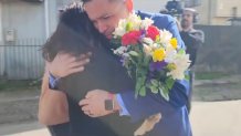 Jimmy Thyden hugs his birth mother, Maria Angelica Gonzalez, for the first time, Aug. 17, 2023, in Valdivia, Chile.