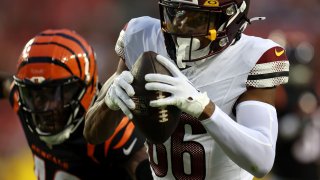 LANDOVER, MARYLAND – AUGUST 26: Wide receiver Mitchell Tinsley #86 of the Washington Commanders catches a second half pass against the Cincinnati Bengals during a preseason game at FedExField on August 26, 2023 in Landover, Maryland. (Photo by Rob Carr/Getty Images)