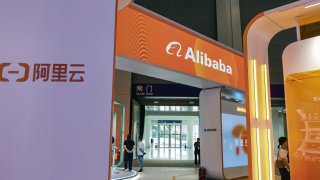 Signage at the Alibaba Group Holding Ltd. booth at the Smart China Expo in Chongqing, China, on Monday, Sept. 4, 2023.