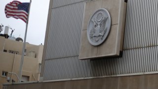 The American flag flies at the U.S embassy building in Tel Aviv, Israel.