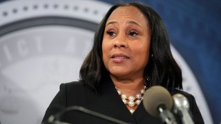 FILE - Fulton County District Attorney Fani Willis speaks in the Fulton County Government Center during a news conference on Aug. 14, 2023, in Atlanta.