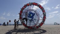 Florida man riding human-sized hamster wheel in Atlantic Ocean arrested on federal charges