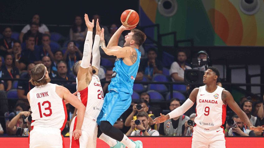 Luka Doncic of Slovenia drives to the basket against Canada as part of the 2023 FIBA World Cup on Sept. 6, 2023, at Mall of Asia Arena in Manila, Philippines.