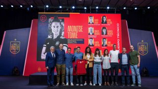 Spain’s new women’s national team coach Montse Tome holds a jersey during her official presentation with her technical staff at the Spanish soccer federation headquarters in Las Rozas, just outside of Madrid, Spain, on Monday, Sept. 18, 2023.