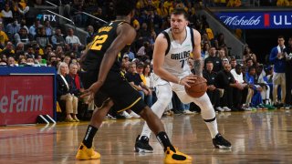 Luka Doncic, #77 of the Dallas Mavericks, handles the ball during Game 1 of the 2022 NBA Playoffs Western Conference Finals at Chase Center in San Francisco on May 18, 2022.
