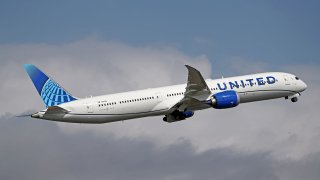 A Boeing 787-10 Dreamliner, from United Airlines, taking off from Barcelona airport in Barcelona on March 28, 2023.