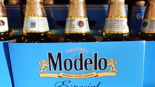 Packages of Modelo Especial beer are displayed for sale in a grocery store on June 14, 2023 in Los Angeles, California. 