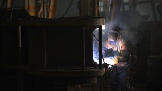 File photo (2019): A worker at LB Steel LLC manufactures a wheel assembly to be used on the new Amtrak Acela trains, which are being built in partnership with Alstom. The trains will run at speeds up to 160 mph carrying passengers along Amtrak’s Northeast Corridor from Boston to Washington, D.C. The trains were initially expected to begin service in 2021.