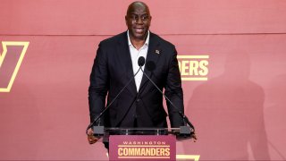 LANDOVER, MARYLAND – JULY 21: Earvin ‘Magic’ Johnson, a new owner of the Washington Commanders, delivers remarks during a press conference introducing the team’s new ownership at FedExField on July 21, 2023 in Landover, Maryland. NFL teams owners have unanimously approved a $6.05 billion sale of the Commanders from Dan Snyder to a group led by Josh Harris. (Photo by Tasos Katopodis/Getty Images)