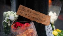 Floral tributes are left for actor Matthew Perry outside the apartment building which was used as the exterior shot in the TV show "Friends" in New York on October 29, 2023. Perry, 54, was known globally for his portrayal of wise-cracking character Chandler Bing on the wildly popular "Friends," which ran for 10 seasons from 1994 to 2004. First responders found Perry unconscious in a hot tub at his house on October 28 and were unable to revive him, law enforcement sources told the Los Angeles Times. Police confirmed they'd mounted a "death investigation for a male in his 50s." (Photo by Adam GRAY / AFP) (Photo by ADAM GRAY/AFP via Getty Images)