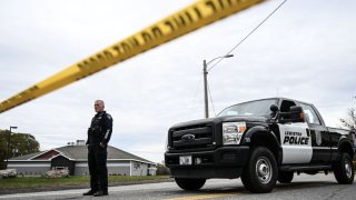 MAINE, UNITED STATES – OCTOBER 26: Security forces take measures at the site where at least 18 people were killed and 13 injured in a mass shooting in Maine, United States on October 26, 2023. Eight victims who died in in Lewiston late Wednesday have been identified while 10 are still pending identification. (Photo by Fatih Aktas/Anadolu via Getty Images)