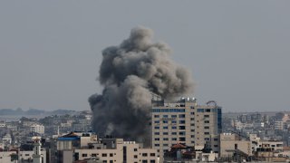 Smoke rises following Israeli strikes in Gaza, October 8, 2023. 
