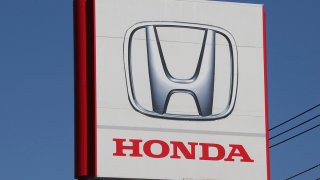 FILE - The Honda logo is seen in Yokohama, near Tokyo, on Dec. 15, 2021.