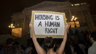 Demonstrators gather during a protest against the expiration of the eviction moratorium outside of the U.S. Capitol in Washington, D.C., Aug. 1, 2021.